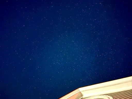 Night Sky Over The Rooftop